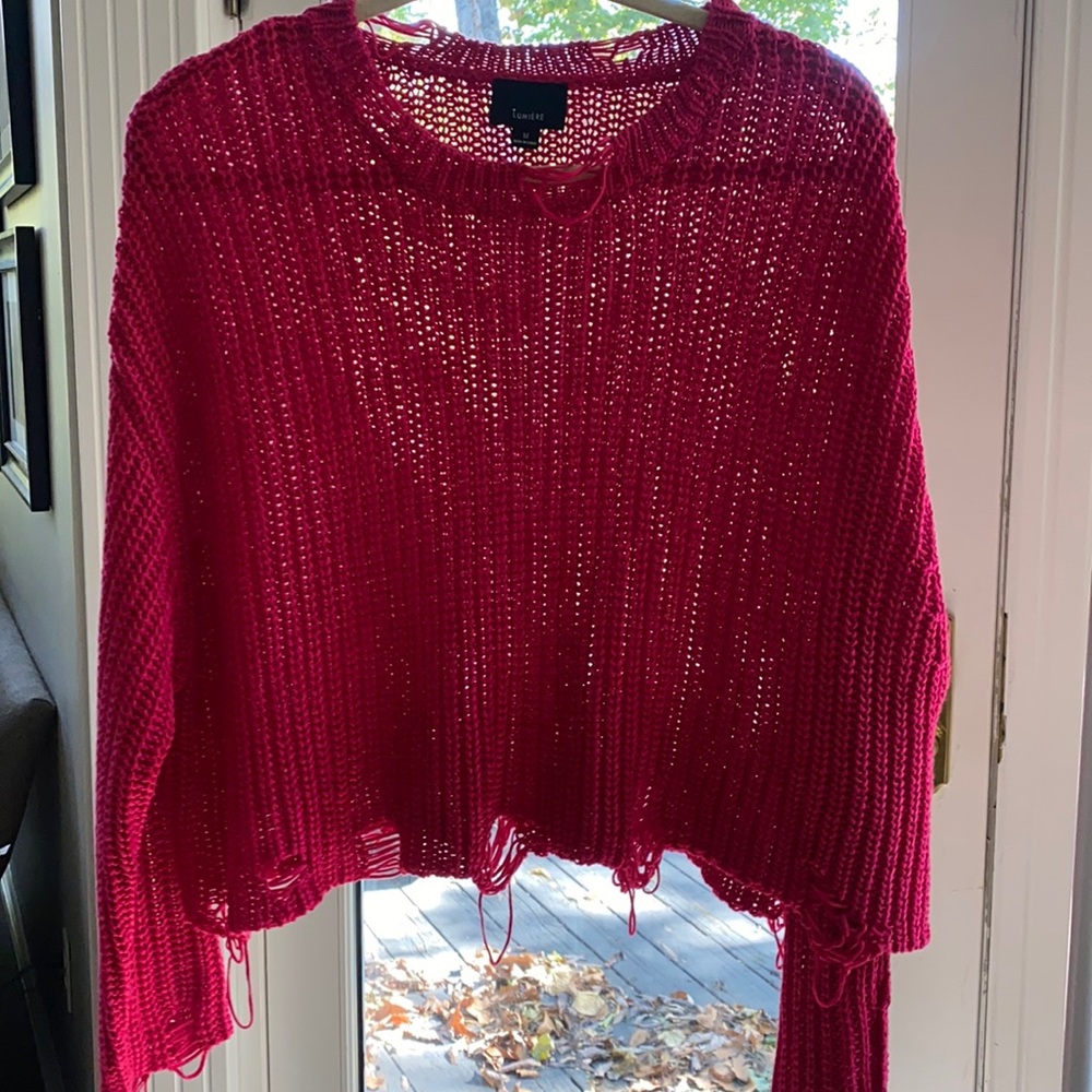 Perfect shade of bright pink distressed sweater.